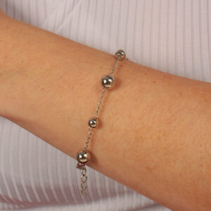 Pulseira bolas lisas espaçadas banhado em ouro branco