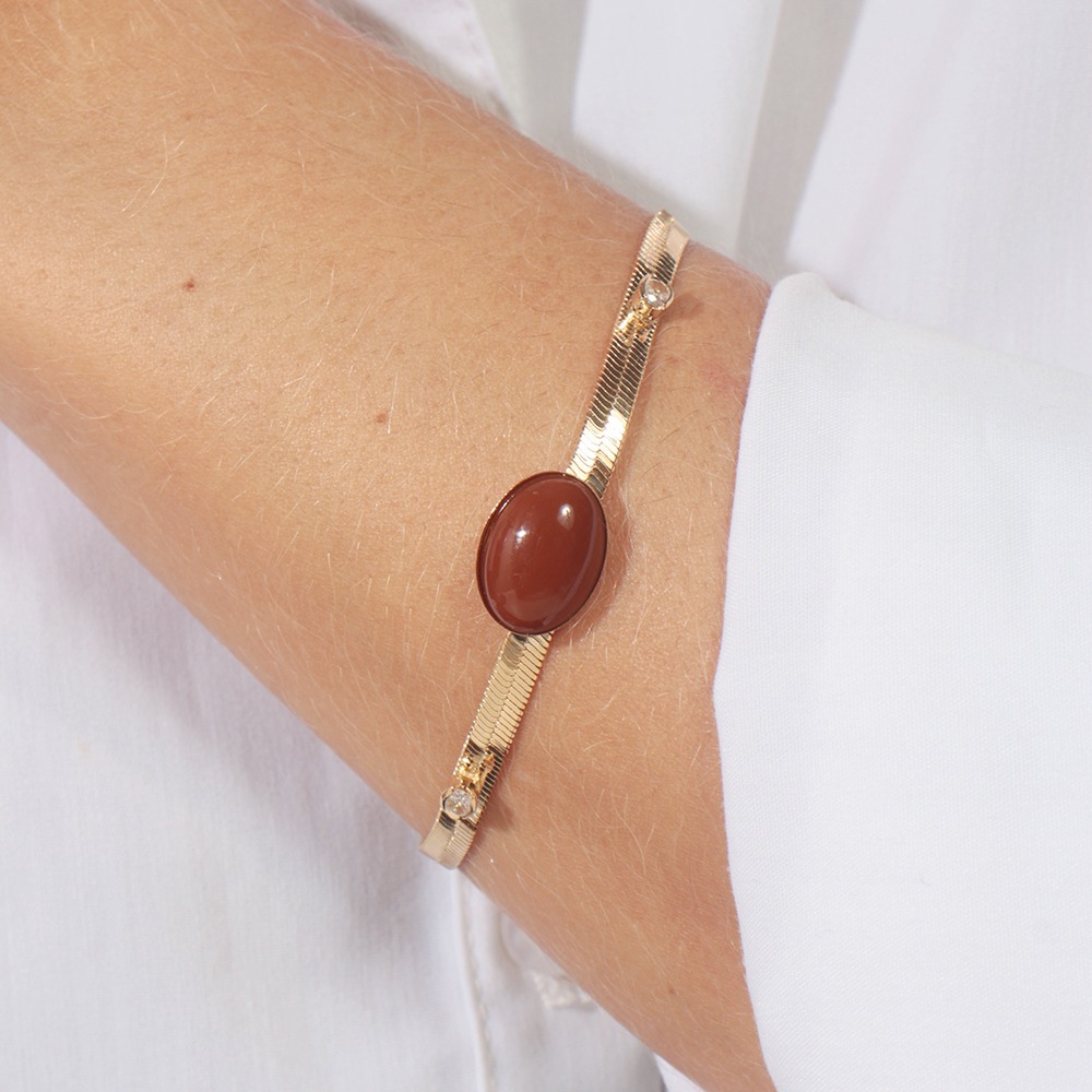 Pulseira fita com pedras marrom banhado em ouro 18k